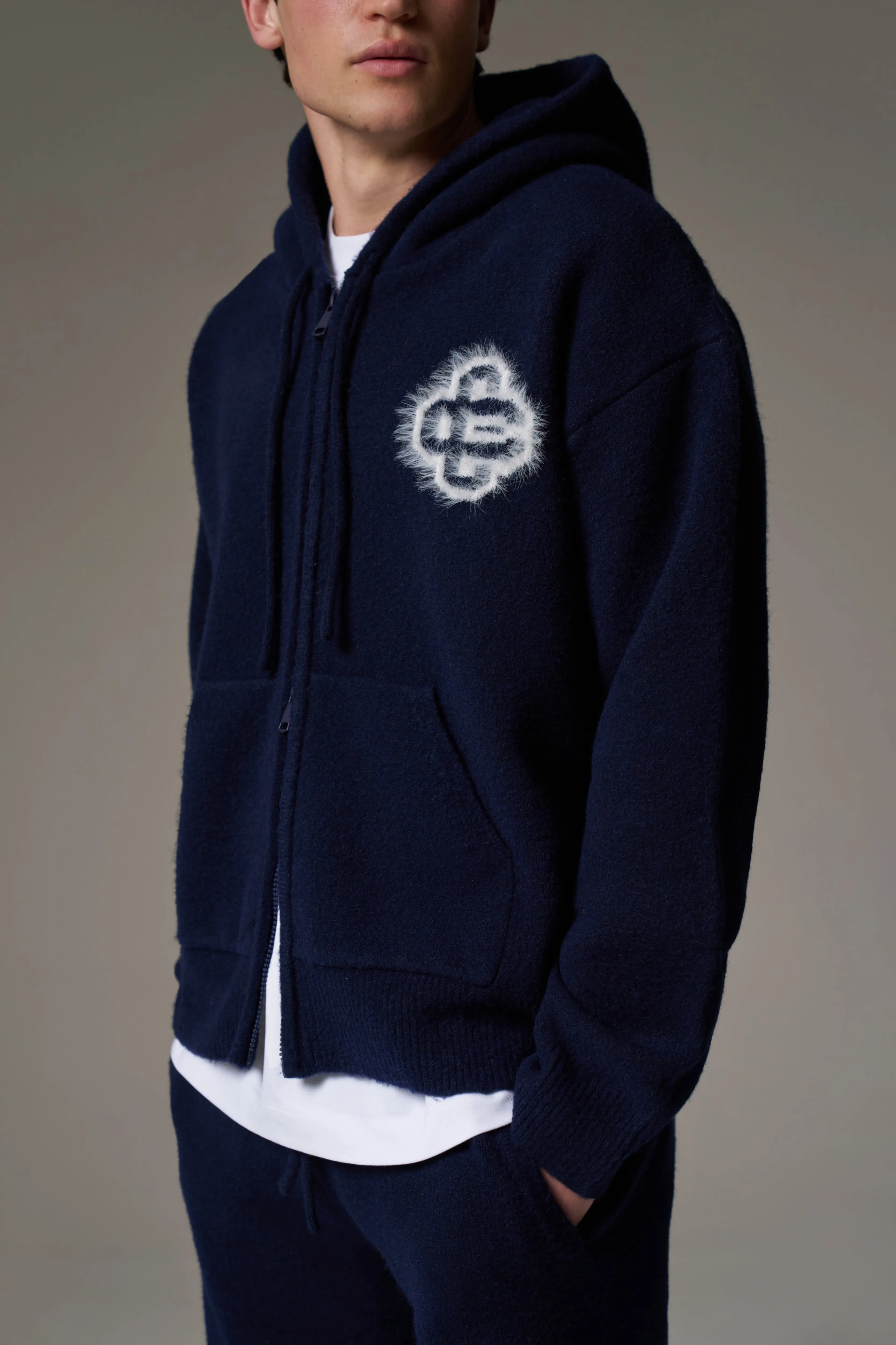 FLUFFY EMBLEM ZIP THROUGH KNITTED HOODIE - NAVY