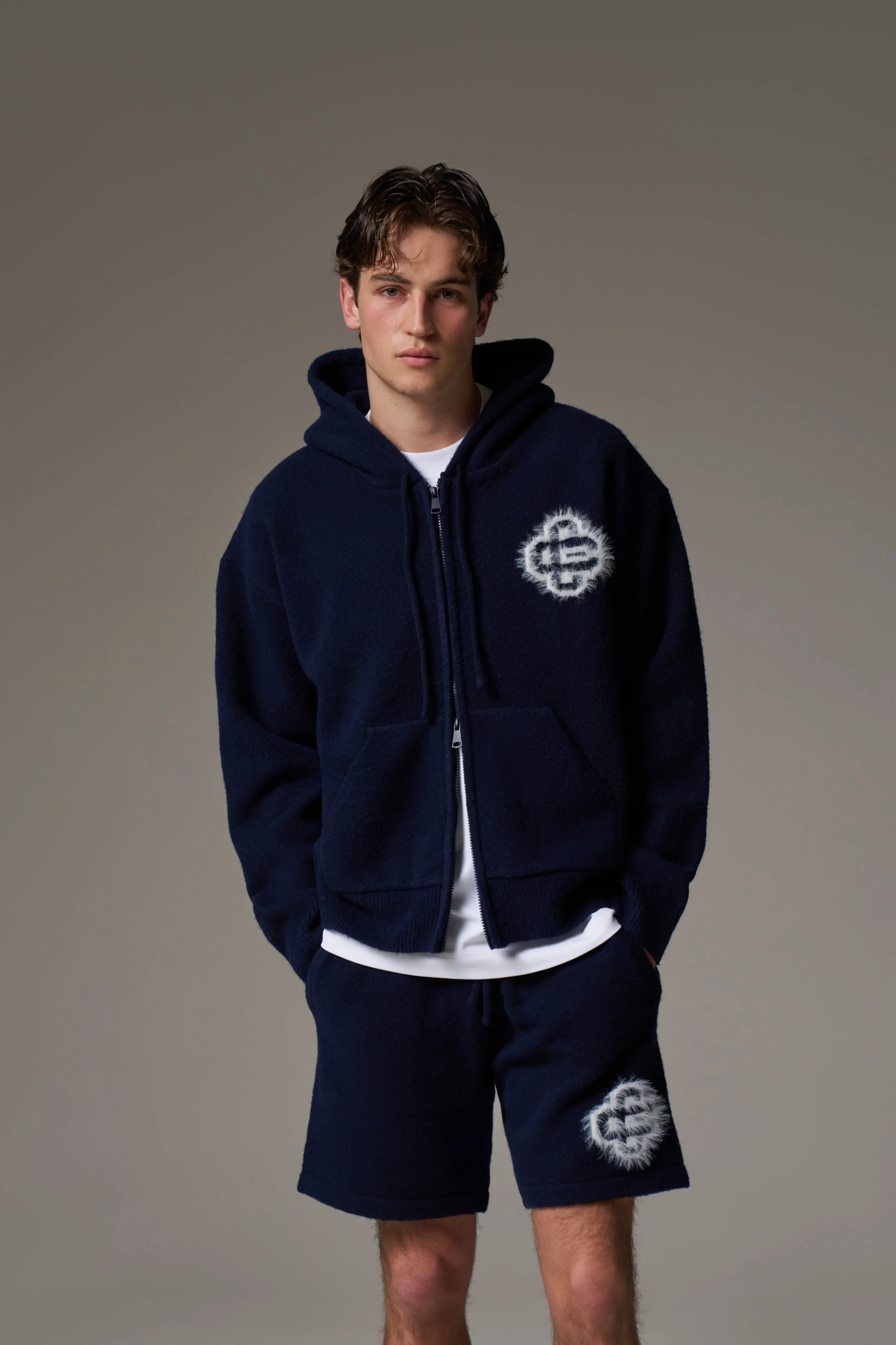 FLUFFY EMBLEM ZIP THROUGH KNITTED HOODIE - NAVY